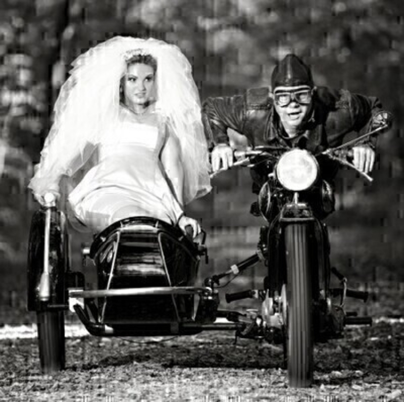 Bride and Groom on Bike Wedding Card by Paper Rose This Wedding greetings card from Paper Rose has a black and white design of a groom on a motorbike and a bride in a sidecar. The card has been left blank inside to write your own message. Card comes complete with silver envelope.